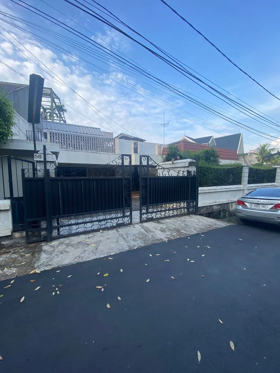 A street-level site photograph of an existing entrance